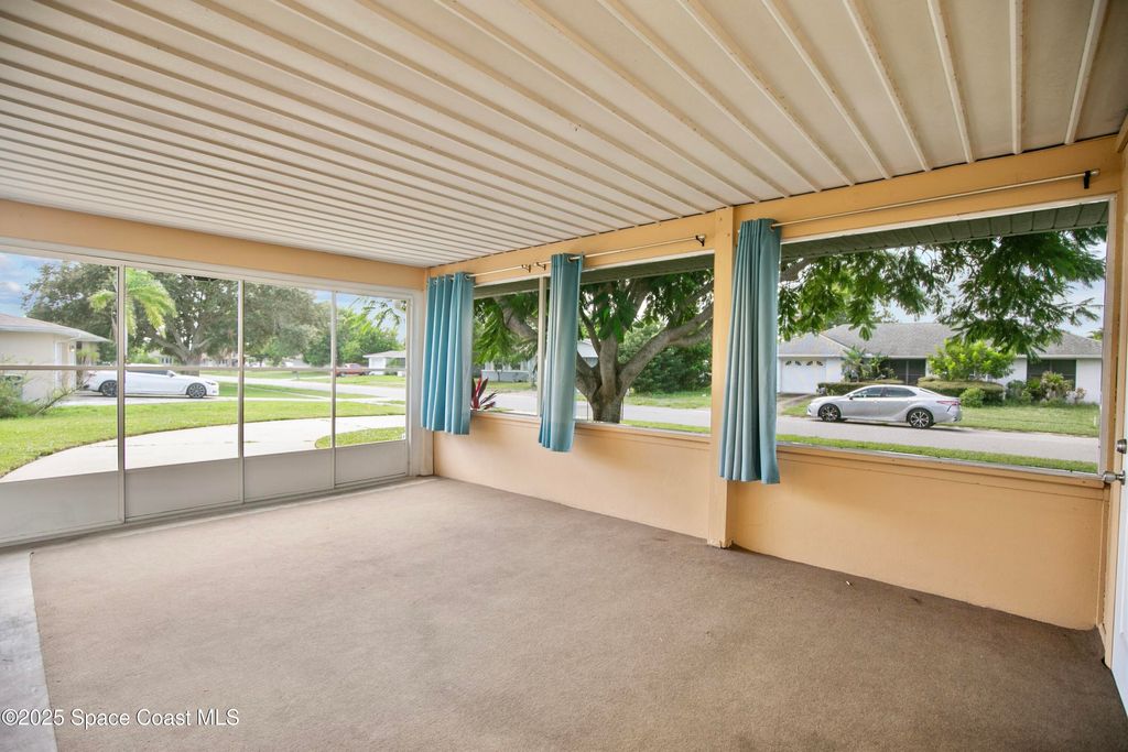 Photo of 831 Edwards Street NE, Palm Bay, FL 32905 (MLS # 1058839)