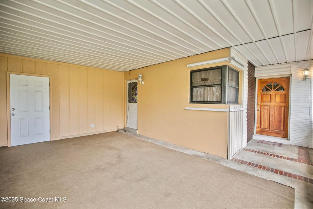 Photo of 831 Edwards Street NE, Palm Bay, FL 32905 (MLS # 1058839)
