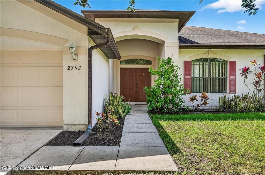 Photo of 2792 Palisades Drive SE, Palm Bay, FL 32909 (MLS # 1059243)