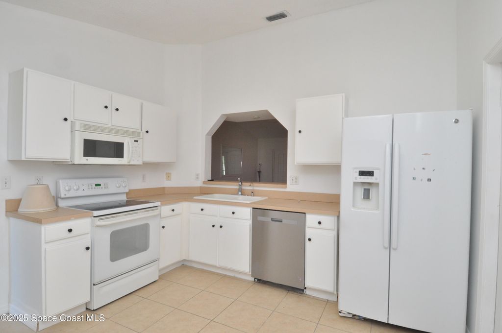 Photo of 854 Reading Street SE, Palm Bay, FL 32909 (MLS # 1055627)