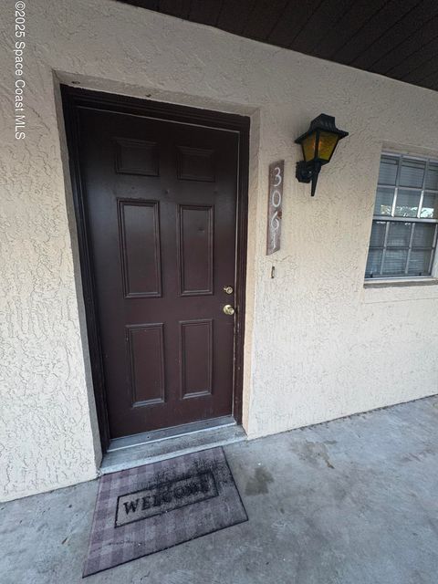 Photo of 3061 Sir Hamilton Circle #10, Titusville, FL 32780 (MLS # 1059484)