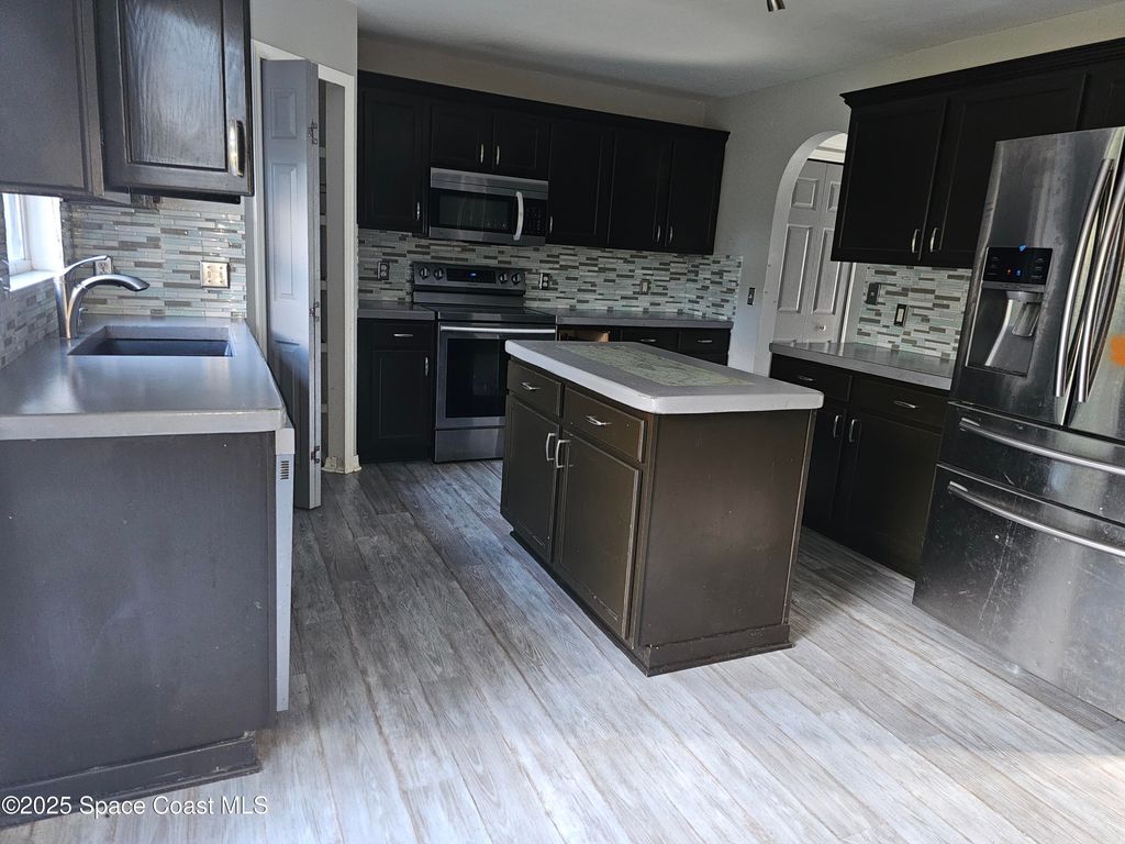 Photo of 1855 Oak Court NW, Palm Bay, FL 32907 (MLS # 1060165)