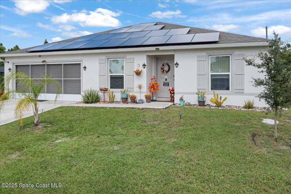Photo of 487 Dadeville Street SE, Palm Bay, FL 32909 (MLS # 1059285)