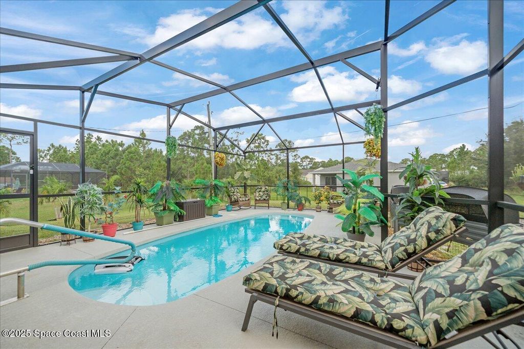 Photo of 487 Dadeville Street SE, Palm Bay, FL 32909 (MLS # 1059285)