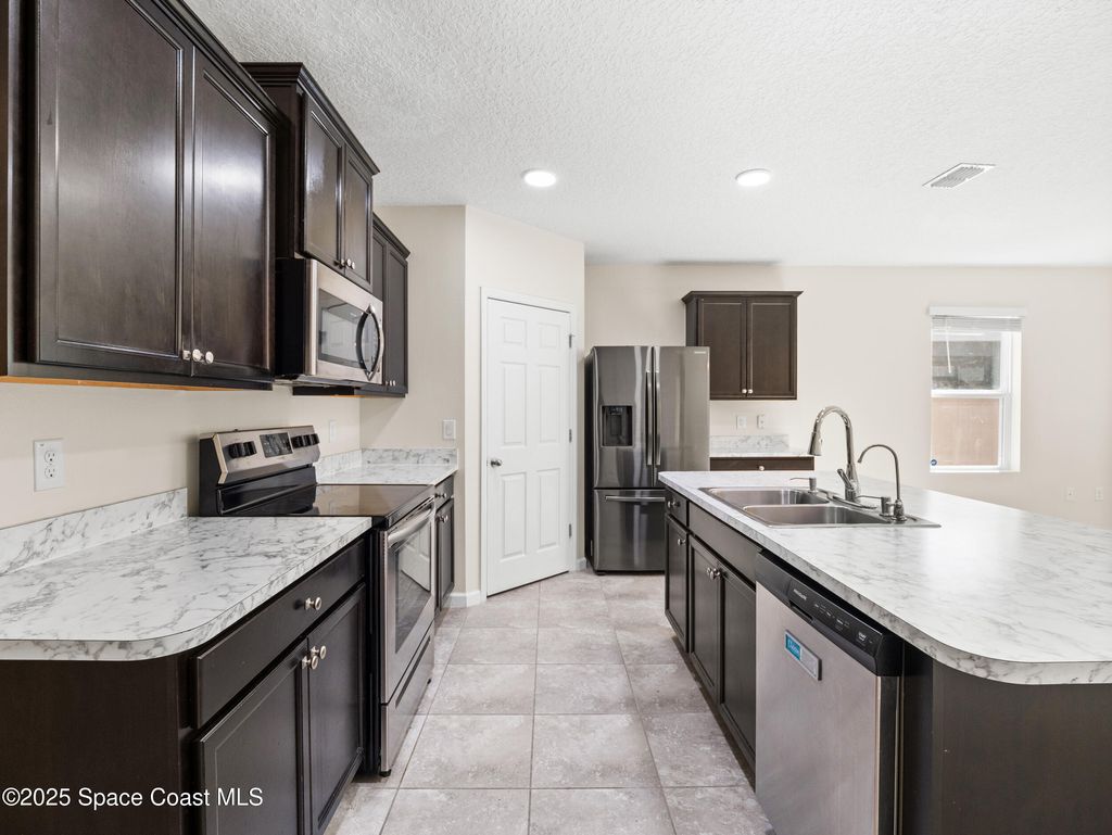 Photo of 340 Forest Trace Circle, Titusville, FL 32780 (MLS # 1060217)
