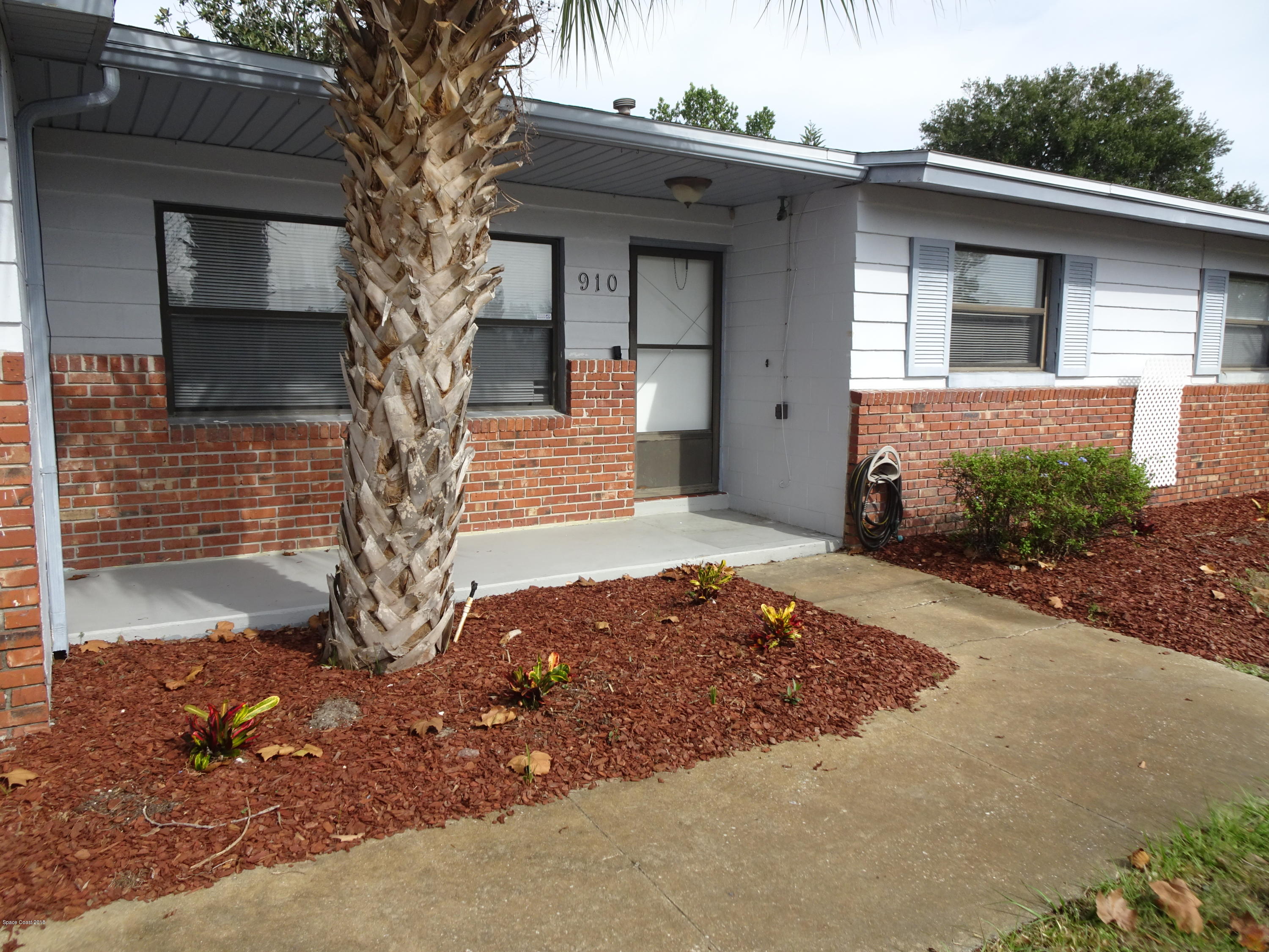 Photo 1 of 22 — 910 Penny Drive, Titusville, FL 32780