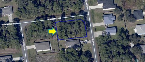 Unimproved Land in Palm Bay FL 3234 Corner Lot On Jared Avenue.jpg