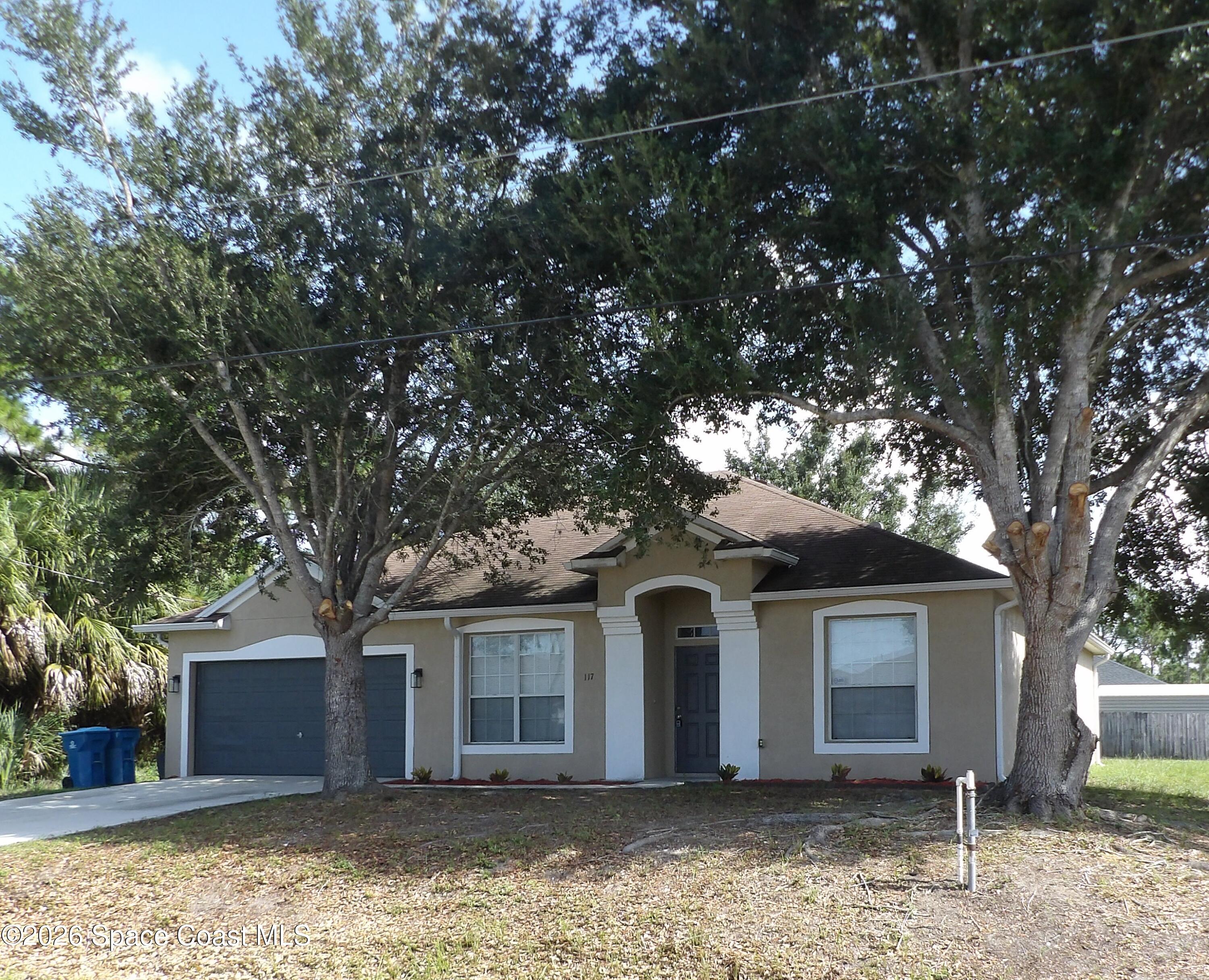 Photo 1 of 18 — 117 Fayetteville Street SW, Palm Bay, FL 32908