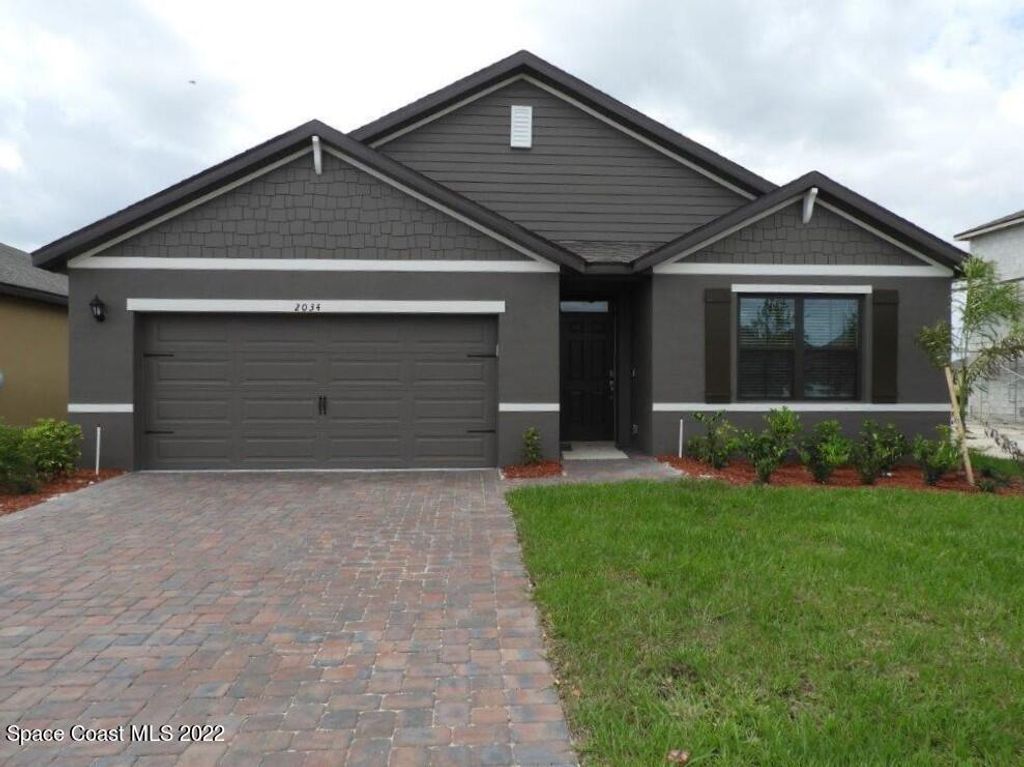 Photo of 2034 Capital Drive SE, Palm Bay, FL 32909 (MLS # 1058667)