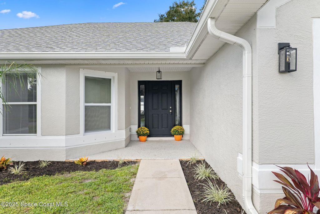 Photo of 2772 Freehold Avenue SE, Palm Bay, FL 32909 (MLS # 1059163)