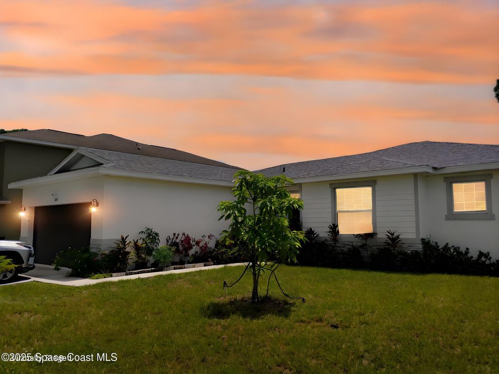 Photo of 1174 SE Hutchins Street SE, Palm Bay, FL 32909 (MLS # 1058186)