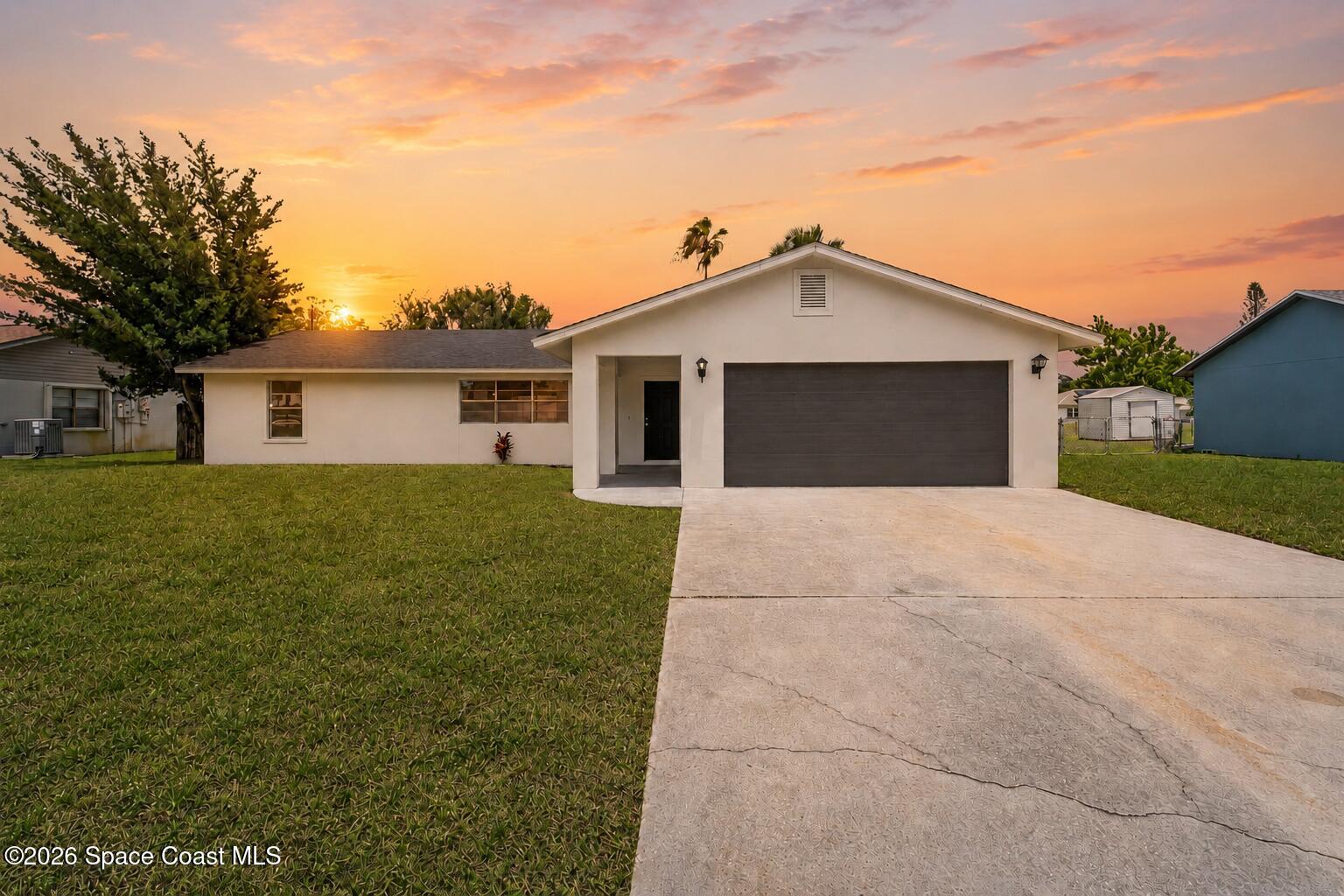 Photo 1 of 23 — 901 Grandeur Street SE, Palm Bay, FL 32909