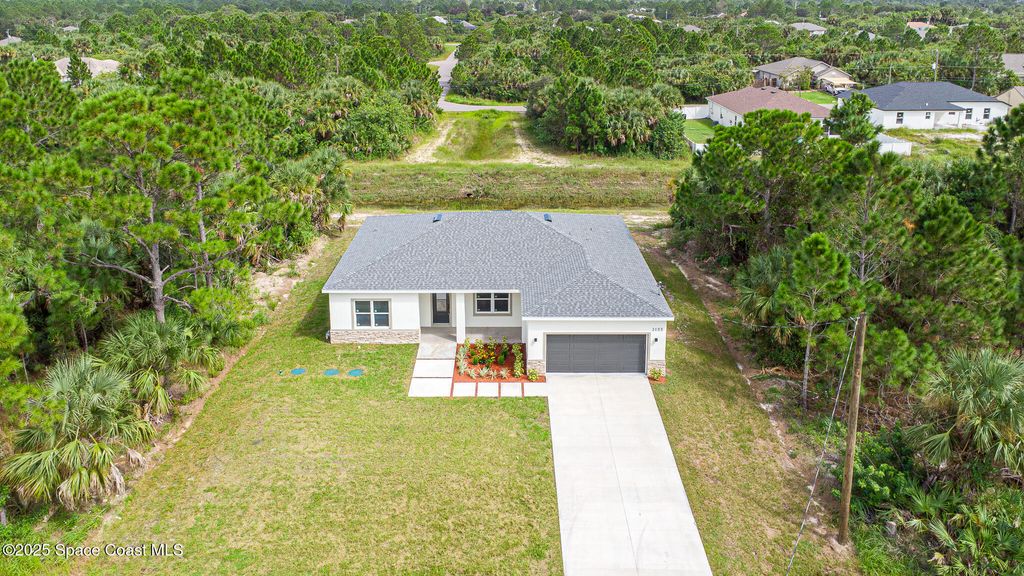 Photo of 3195 S Fitzpatrick Avenue SW, Palm Bay, FL 32908 (MLS # 1058970)