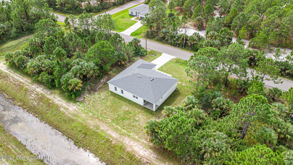 Photo of 3195 S Fitzpatrick Avenue SW, Palm Bay, FL 32908 (MLS # 1058970)