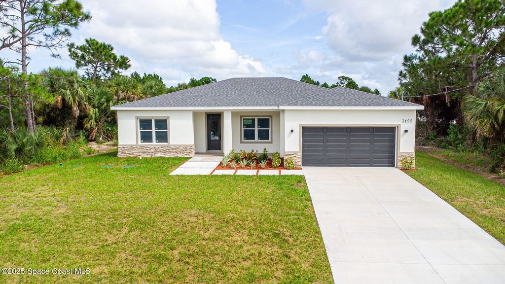 Photo of 3195 S Fitzpatrick Avenue SW, Palm Bay, FL 32908 (MLS # 1058970)