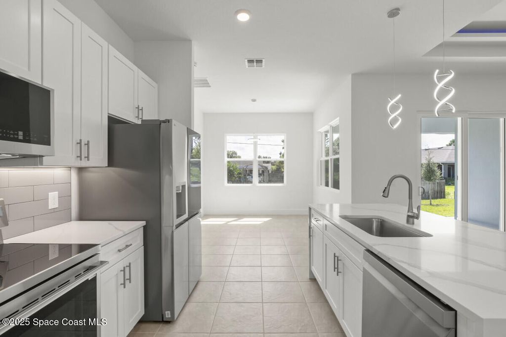 Photo of 1674 Burgandy Street SE, Palm Bay, FL 32909 (MLS # 1058699)