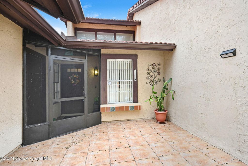 Photo of 815 Brae Court NE, Palm Bay, FL 32905 (MLS # 1057328)