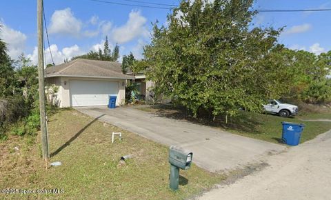 Photo of 3326 Florala Avenue SW, Palm Bay, FL 32908 (MLS # 1059485)
