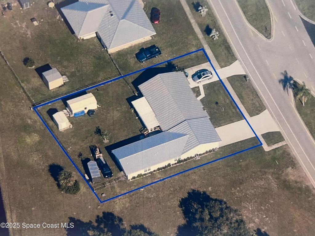 Photo of 296 Port Malabar Boulevard NE, Palm Bay, FL 32905 (MLS # 1056397)