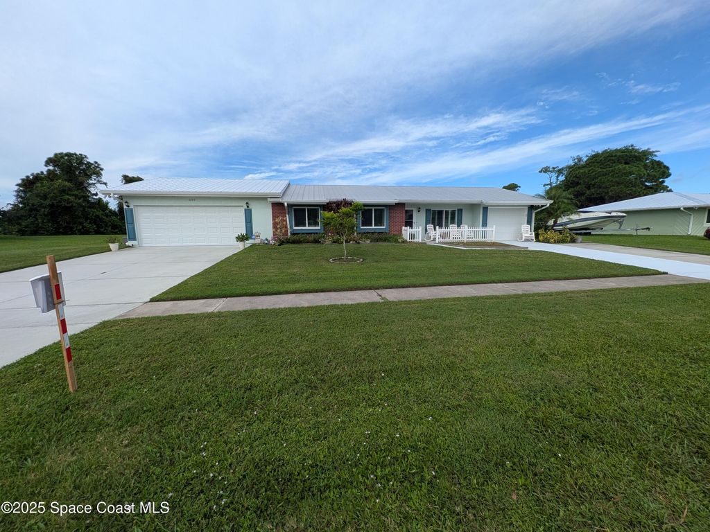 Photo of 296 Port Malabar Boulevard NE, Palm Bay, FL 32905 (MLS # 1056397)