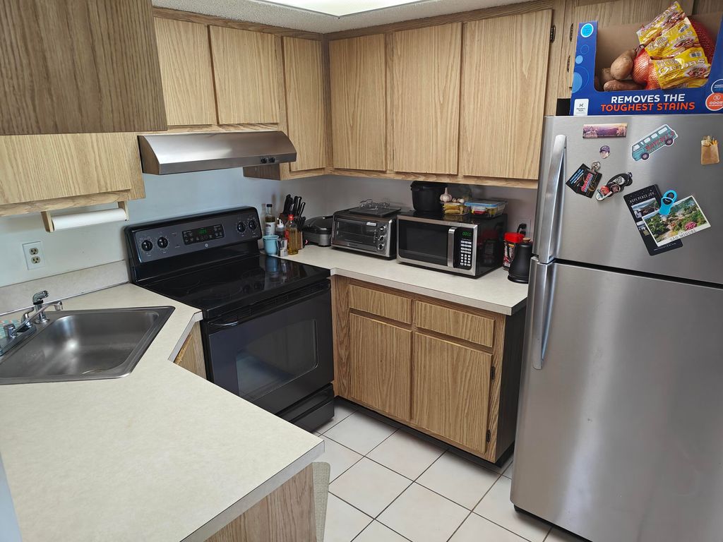 Photo of 1624 Sunny Brook Lane NE #203, Palm Bay, FL 32905 (MLS # 1056003)