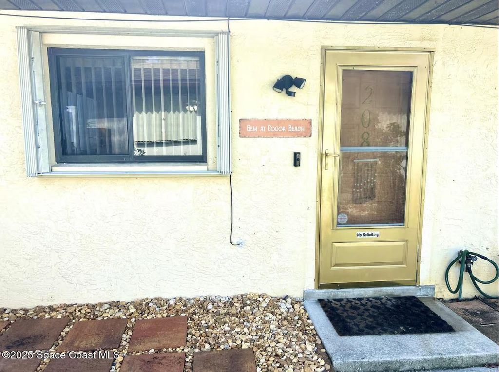 Photo of 208 Cleveland Avenue, Cocoa Beach, FL 32931 (MLS # 1060187)