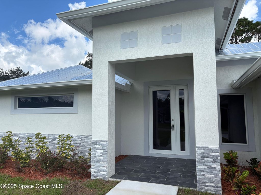Photo of 3839 SE Jupiter Boulevard SE, Palm Bay, FL 32909 (MLS # 1057025)
