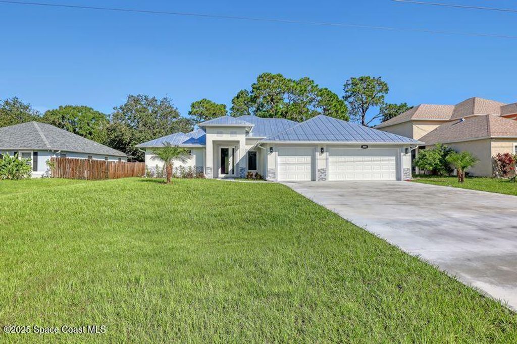Photo of 3839 SE Jupiter Boulevard SE, Palm Bay, FL 32909 (MLS # 1057025)