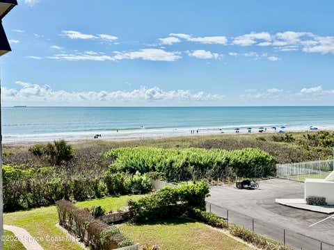 2 beds bed, 2 baths bath property at 4100 Ocean Beach Boulevard 406, Cocoa Beach, FL 32931