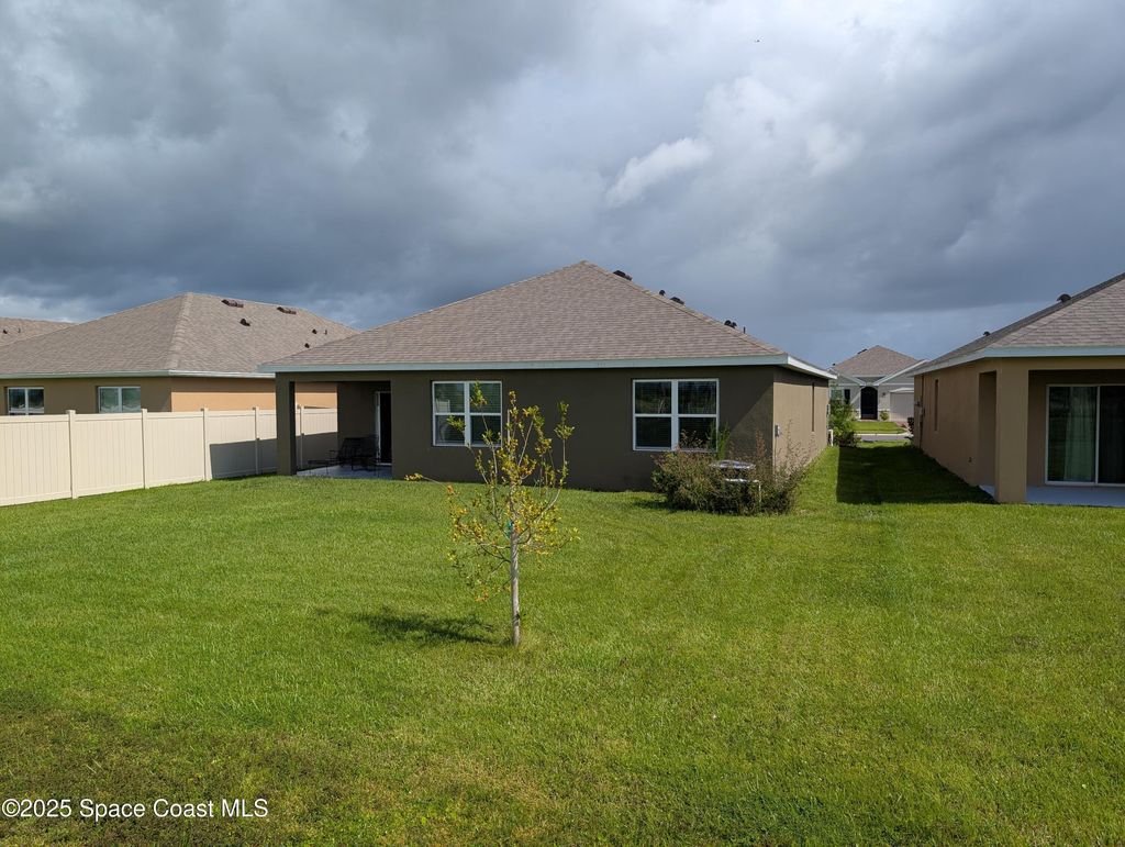 Photo of 1015 Dugan Circle SE, Palm Bay, FL 32909 (MLS # 1058605)