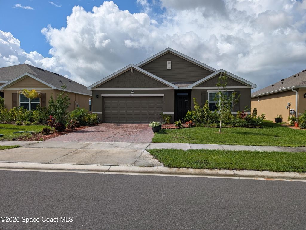Photo of 1015 Dugan Circle SE, Palm Bay, FL 32909 (MLS # 1058605)
