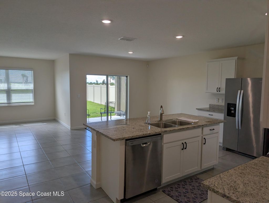 Photo of 1015 Dugan Circle SE, Palm Bay, FL 32909 (MLS # 1058605)