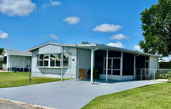 605 OLEANDER CIR, BAREFOOT BAY, FL 32976 - Image d9755f334e25be86225a2bfdbdbd9b85/1507957327