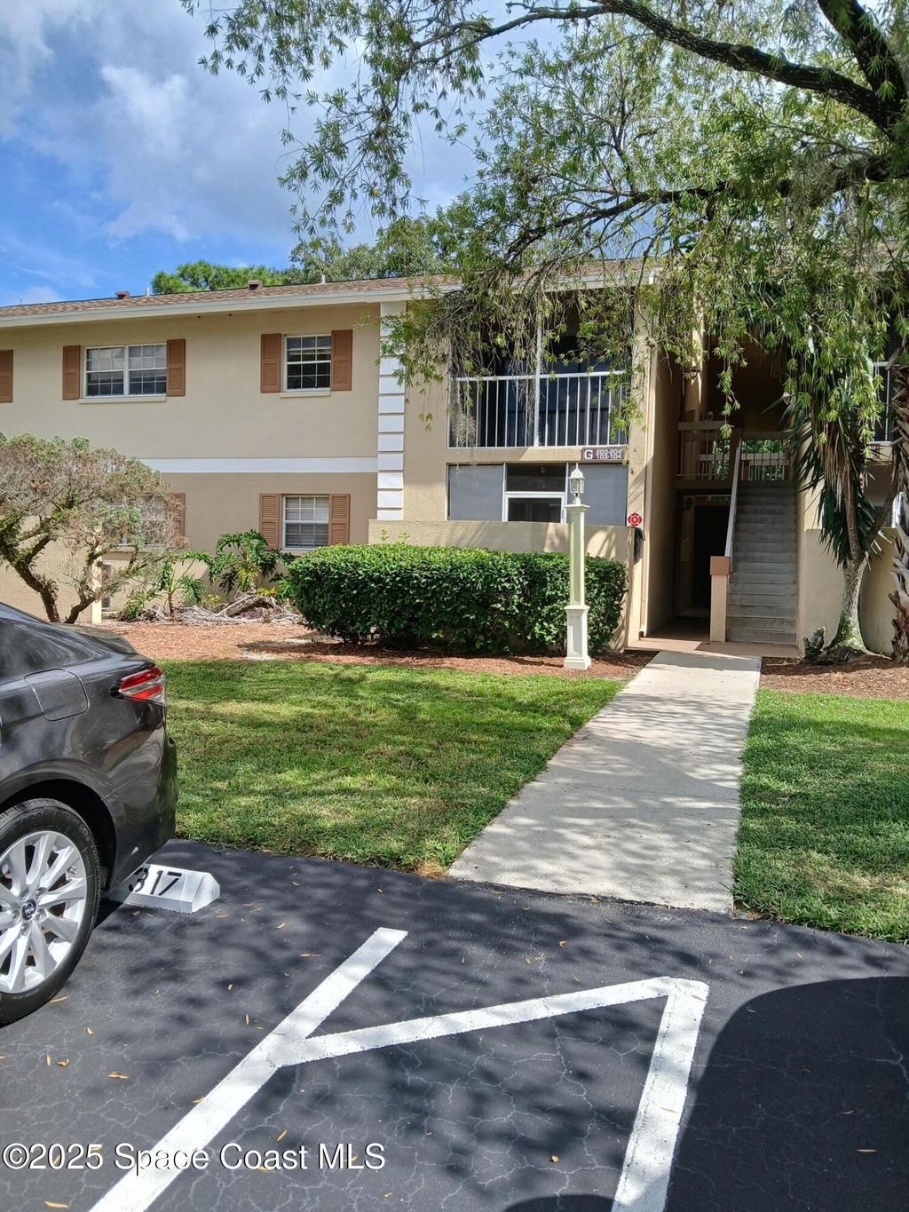 Photo of 1698 Sunny Brook Lane NE #G203, Palm Bay, FL 32905 (MLS # 1058411)