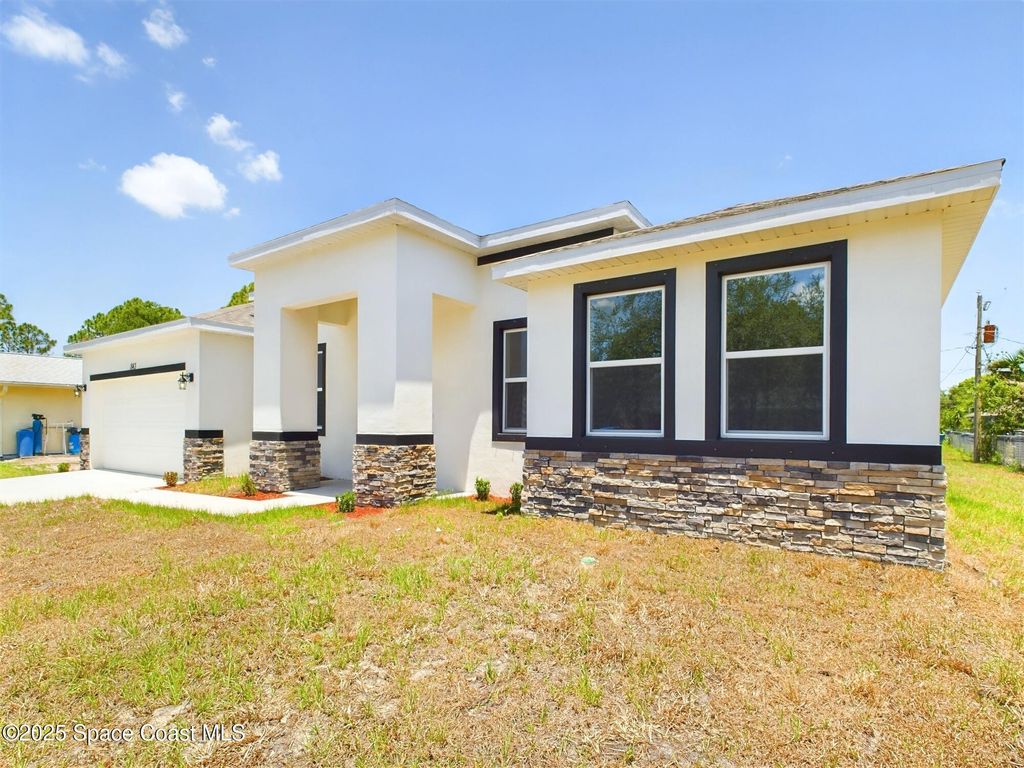 Photo of 692 Mistletoe Street SW, Palm Bay, FL 32908 (MLS # 1056545)
