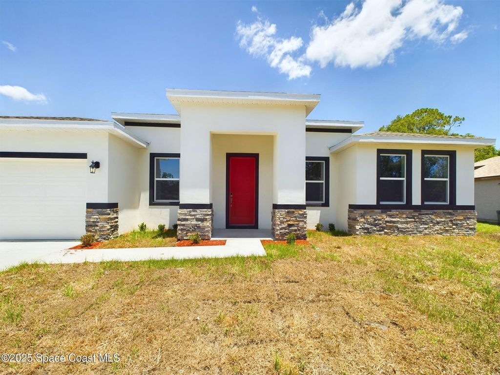 Photo of 692 Mistletoe Street SW, Palm Bay, FL 32908 (MLS # 1056545)
