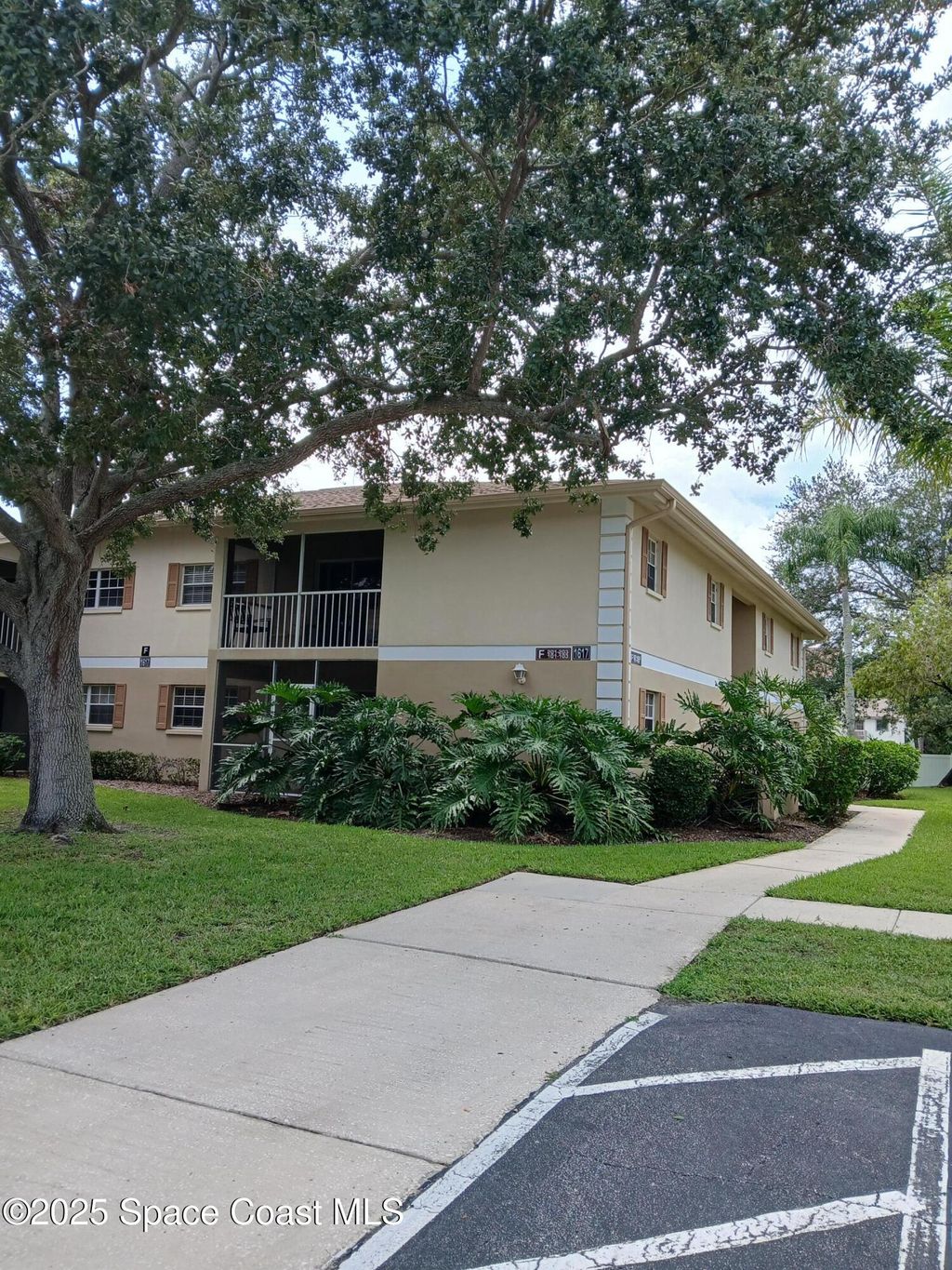 Photo of 1617 Sunny Brook Lane NE #F103, Palm Bay, FL 32905 (MLS # 1056858)