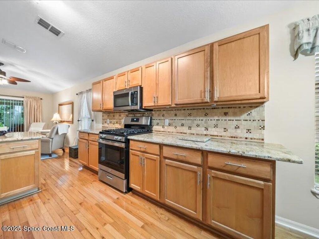 Photo of 2187 Spring Creek Circle, Palm Bay, FL 32905 (MLS # 1055560)