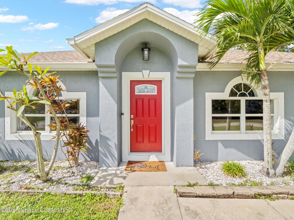 Photo of 940 Jupiter Boulevard NW, Palm Bay, FL 32907 (MLS # 1059300)