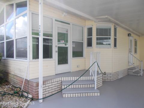 209 Kiwi Drive NE Barefoot Bay FL 32976