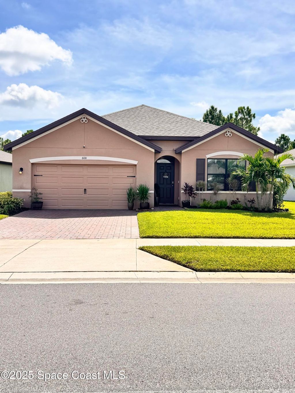 Photo of 668 Old Country Road SE, Palm Bay, FL 32909 (MLS # 1055785)