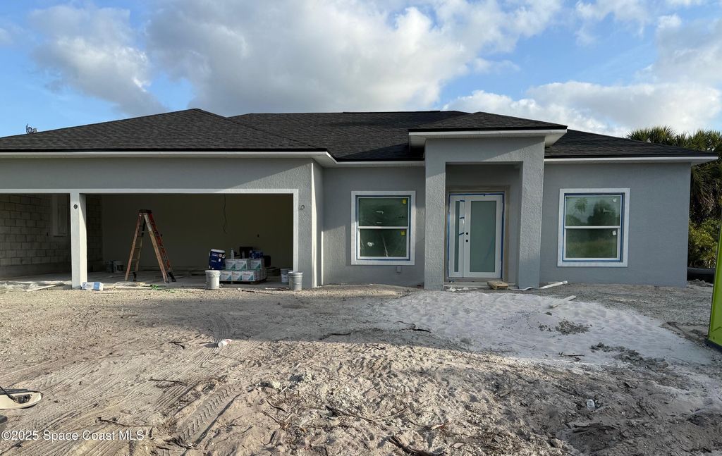 Photo of 660 Yardley Street SW, Palm Bay, FL 32908 (MLS # 1058325)