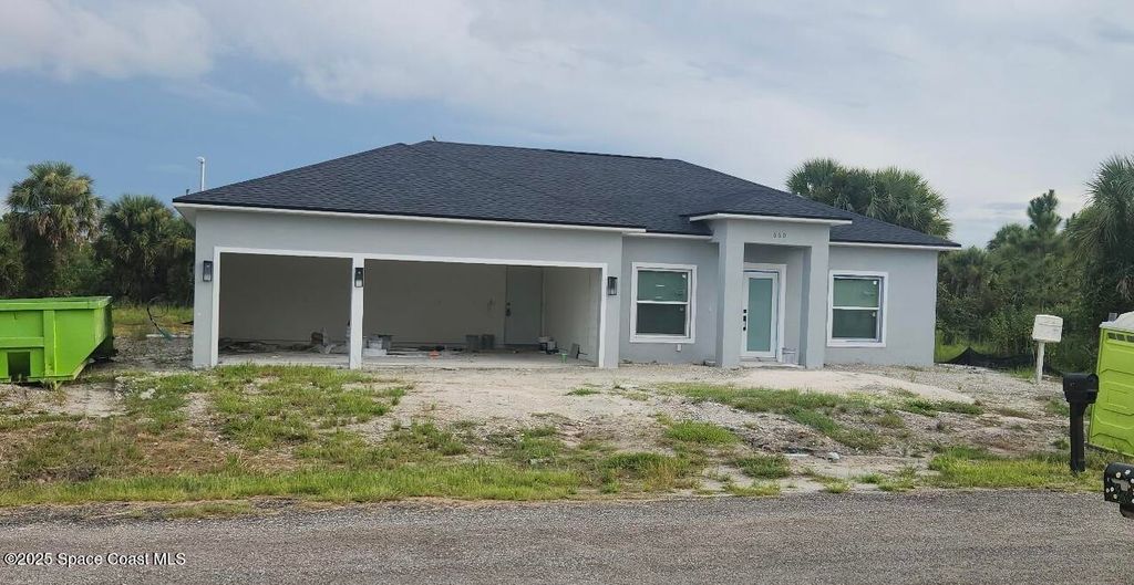 Photo of 660 Yardley Street SW, Palm Bay, FL 32908 (MLS # 1058325)