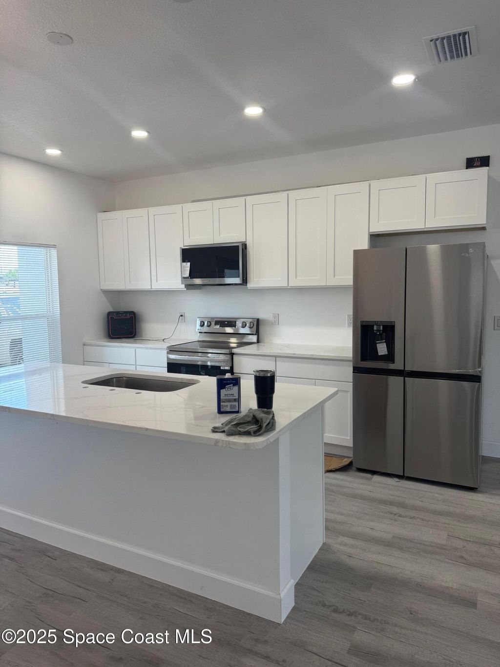 Photo of 660 Yardley Street SW, Palm Bay, FL 32908 (MLS # 1058325)