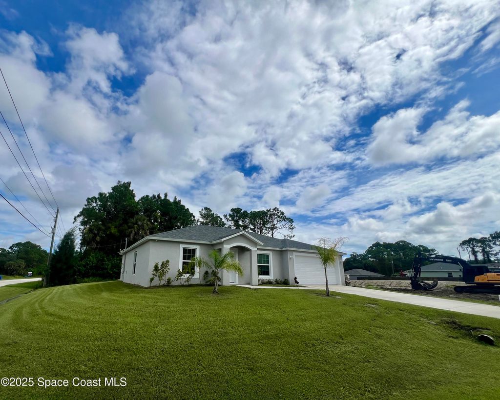 Photo of 499 Oakleaf Street SW, Palm Bay, FL 32908 (MLS # 1055535)