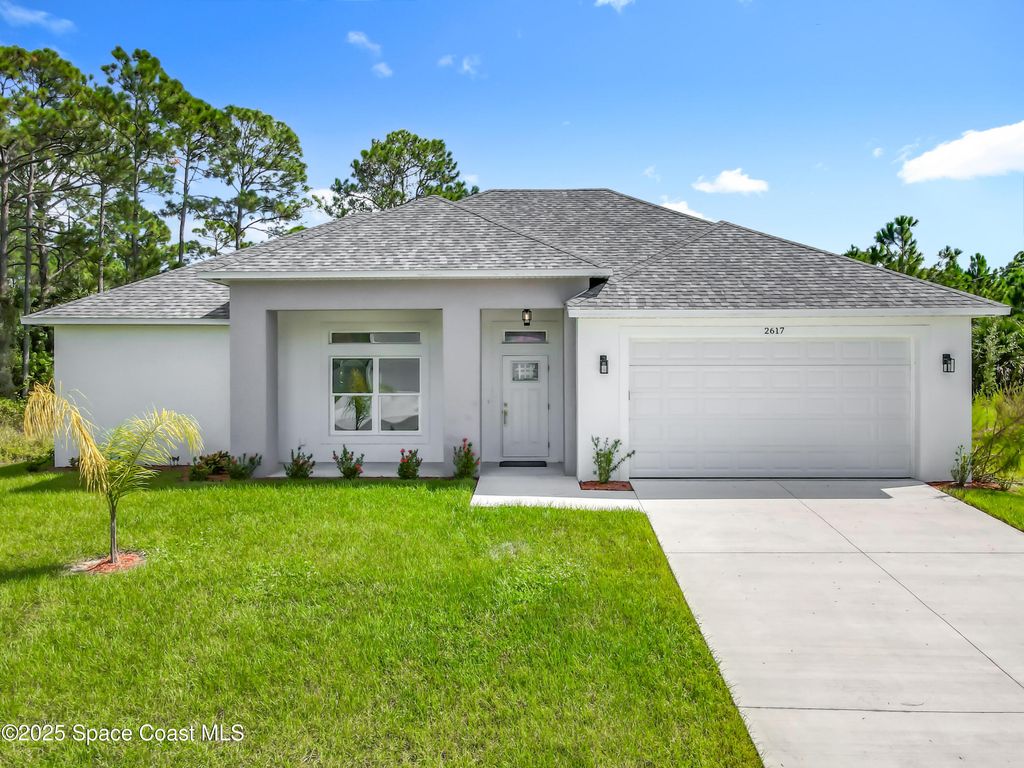 Photo of 2617 De Groodt Road SW, Palm Bay, FL 32908 (MLS # 1060238)