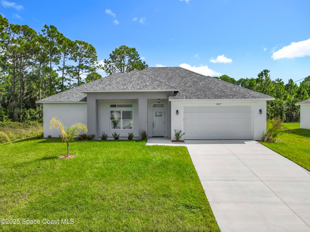 Photo of 2617 De Groodt Road SW, Palm Bay, FL 32908 (MLS # 1060238)