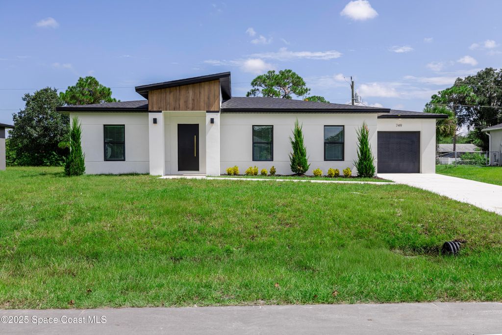 Photo of 749 Darby Avenue SW, Palm Bay, FL 32908 (MLS # 1058764)
