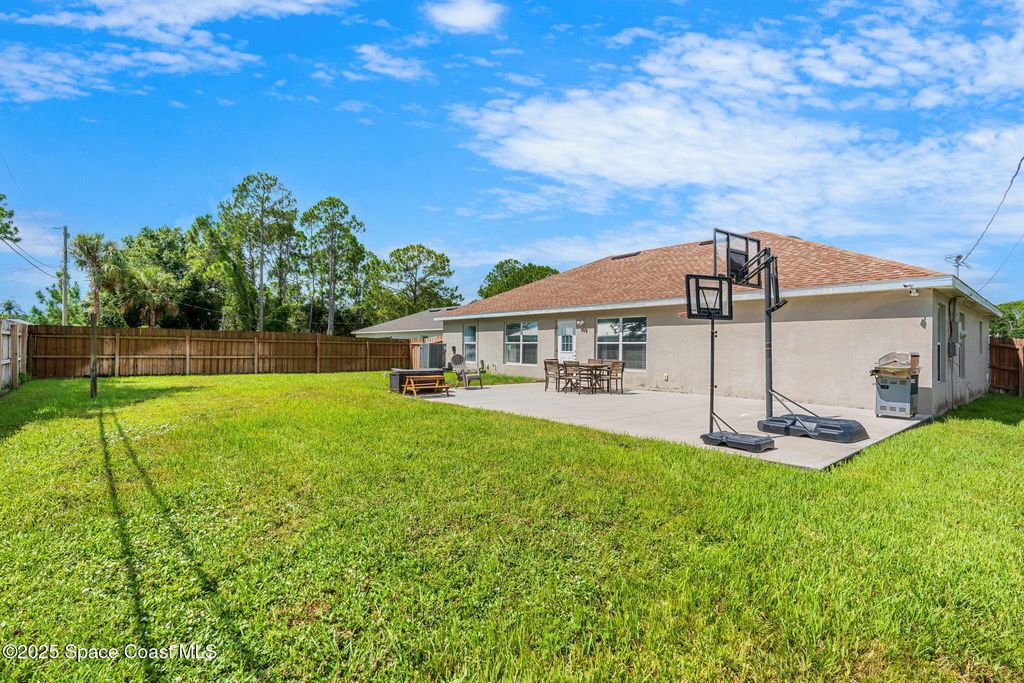 Photo of 413 Grenadier Avenue NW, Palm Bay, FL 32907 (MLS # 1055625)