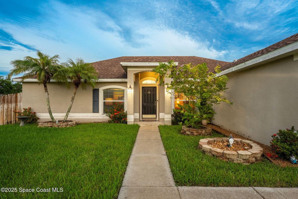 Photo of 413 Grenadier Avenue NW, Palm Bay, FL 32907 (MLS # 1055625)